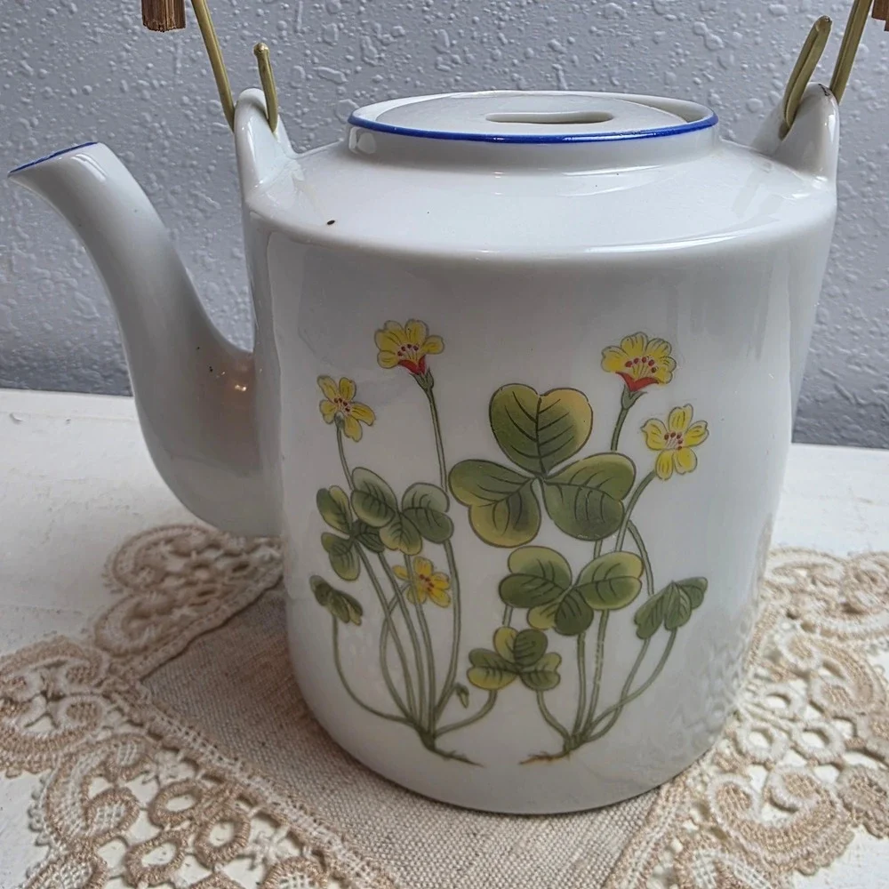 Vintage Ceramic Botanica Teapot Yellow Floral Clover Blue Trim Lid Rattan Handle